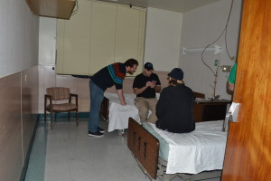 Castle leading a group in an EVP session at Asylum 49.